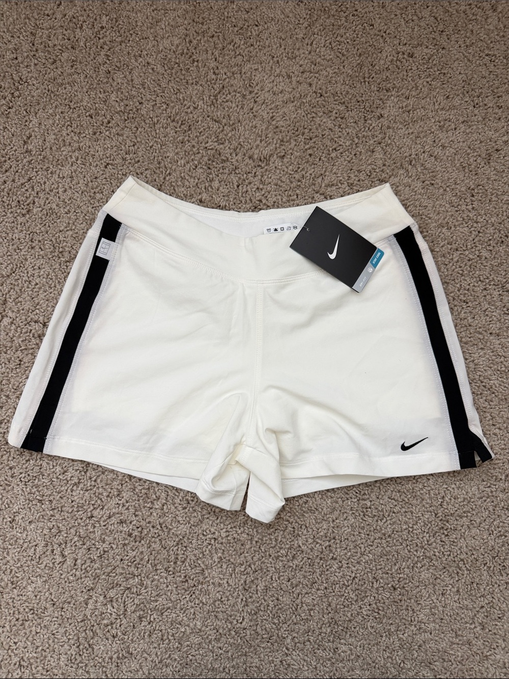 Nike White Women’s Athletic Shorts with Black Side Stripes